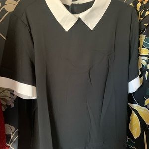 Cute black top with white trim